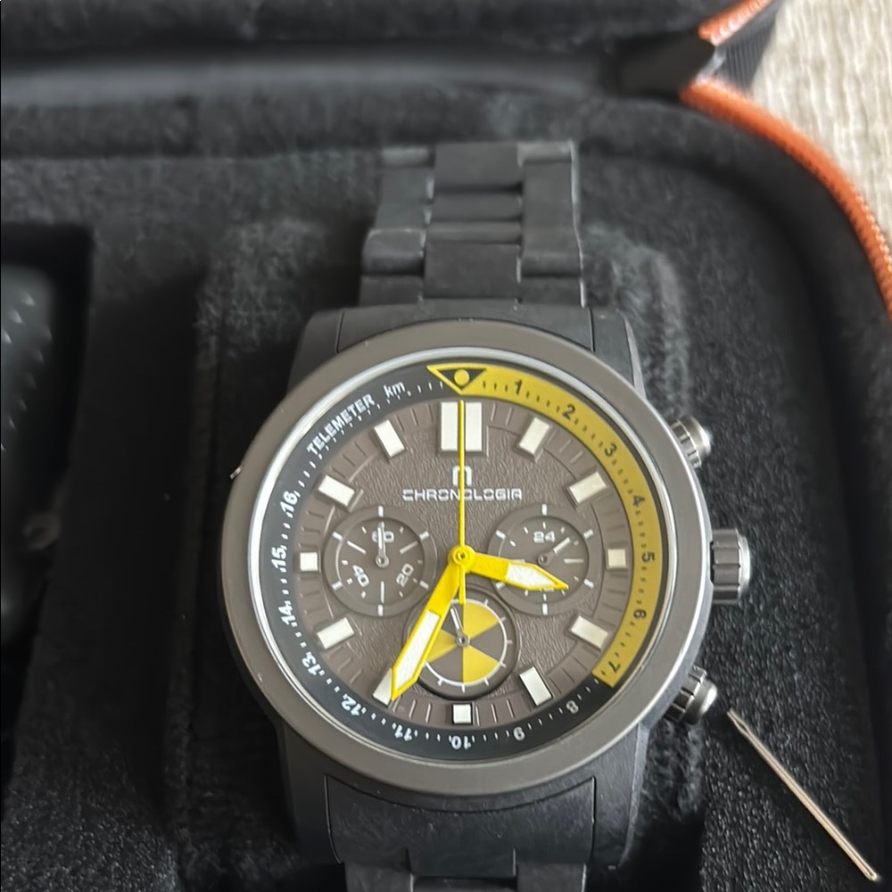 Black Chronograph Watch with Yellow Accents